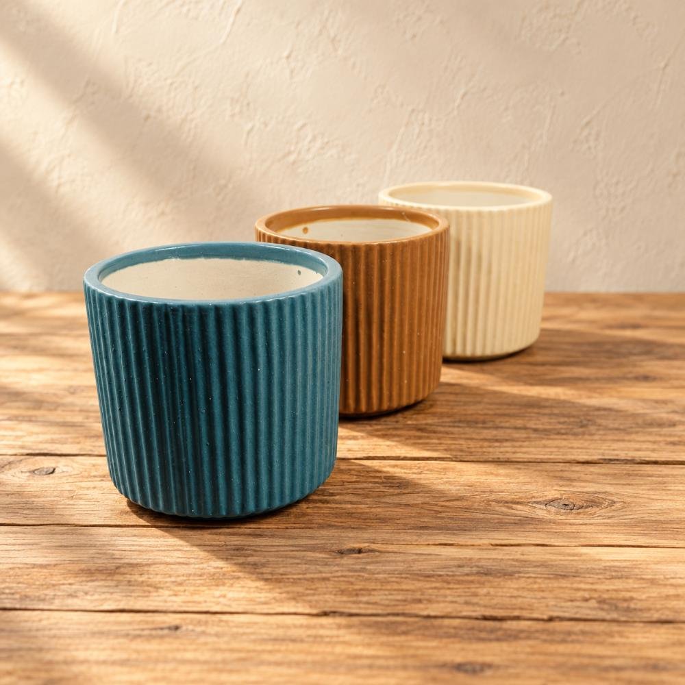 aap-002-teal-rust-ivory-ribbed-ceramic-pot-set-ai-lifestyle-01 Teal Rust Ivory Ribbed Ceramic Pot Set - Image 1