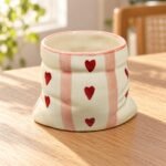 White Sculpted Ceramic Cup - Image 2